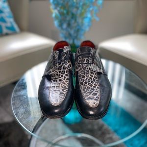 Black and patterned white leather shoe